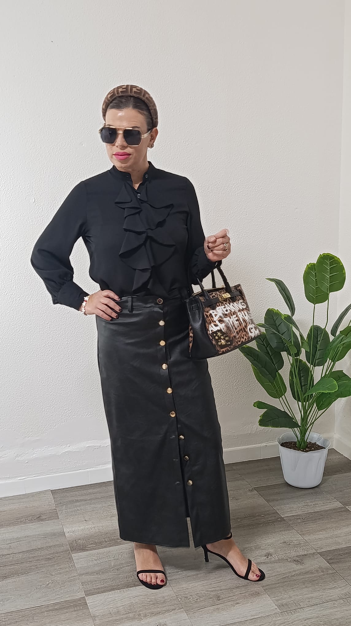 Gonna nera in pelle midi